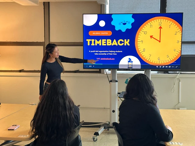 Aliya Fung presenting TimeBack to students at the Millbrae chapter’s first meeting.