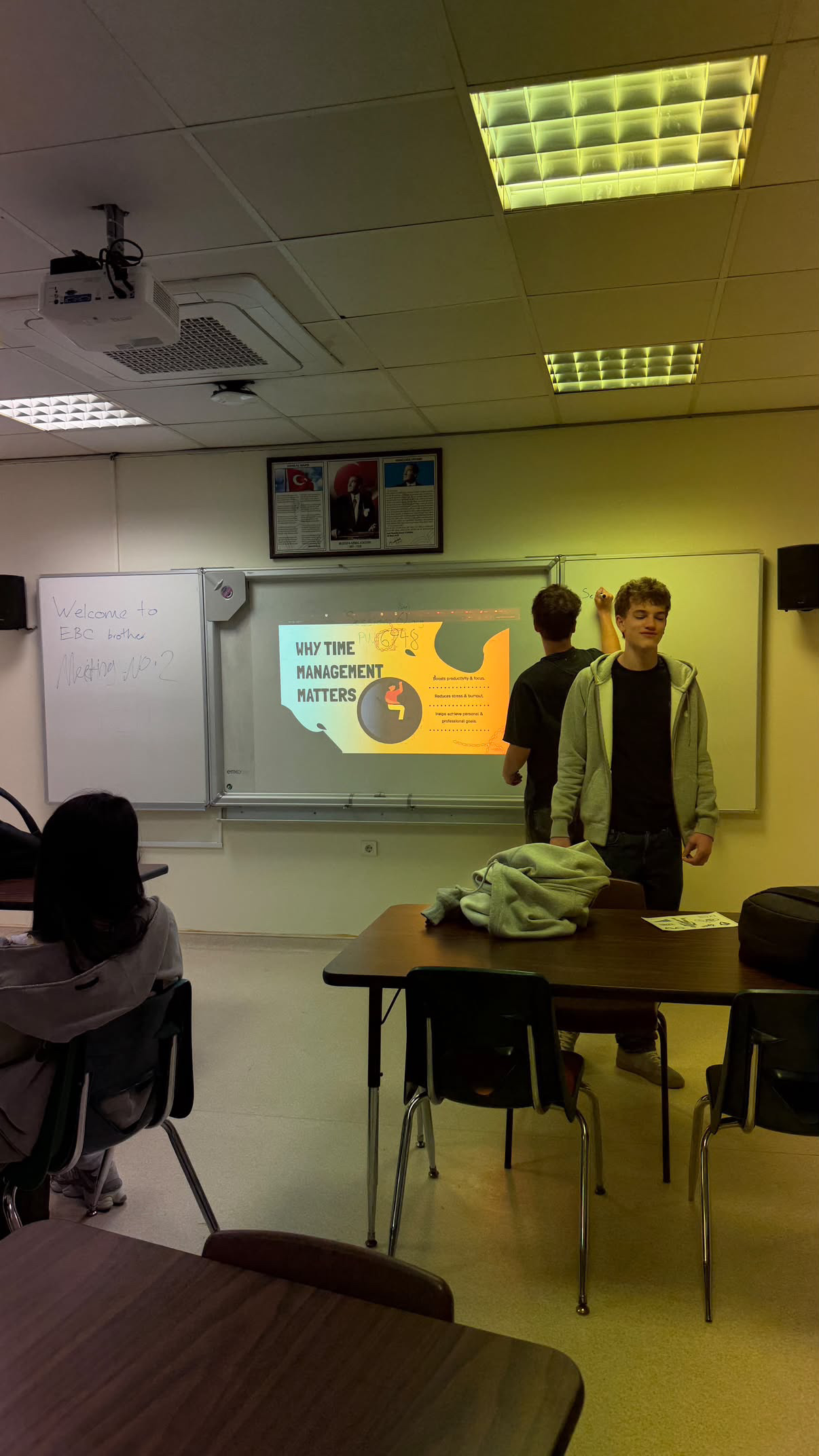 The Turkey chapter team presenting and writing on the board.